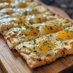 ['Close-up view of a golden-brown cottage cheese flatbread, showcasing its fluffy texture.', 'Side view of a freshly baked cottage cheese flatbread with a crispy exterior and visible cheese.', 'Juicy cottage cheese flatbread presented on a plate, highlighting its fluffy interior and herbs.', 'Detailed shot of cottage cheese flatbread, emphasizing its soft texture and savory toppings.']